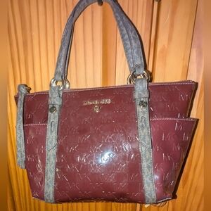 Michael Kors small Sullivan top zip patent leather handbag.